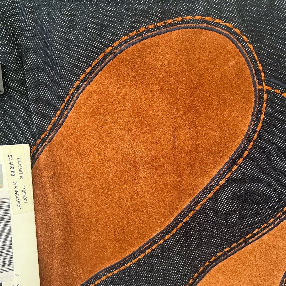 D&G Denim perfect blues Top with rust color suede swirls and adjustable straps…